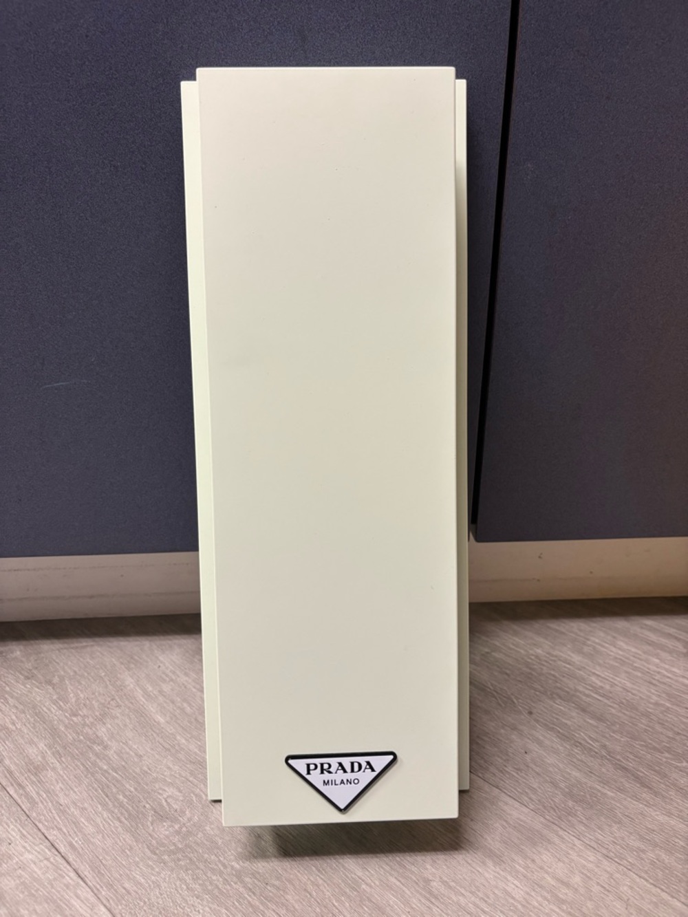 Prada Cream Leather Triangle Logo Stand